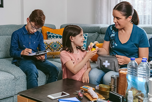 mother and her two children prepping materials